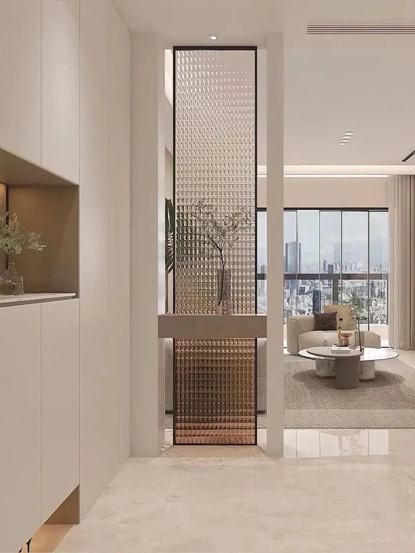 Stainless steel grid screen partition at a contemporary apartment entry
