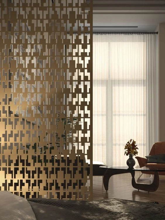 Gold mashrabiya metal room divider in a living space