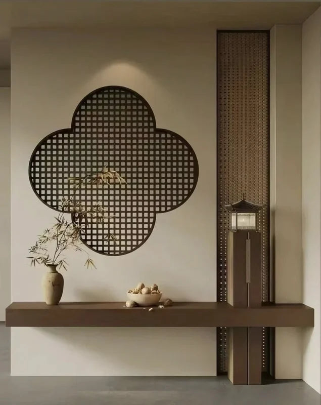 Shaped stainless steel lattice screen above an interior console