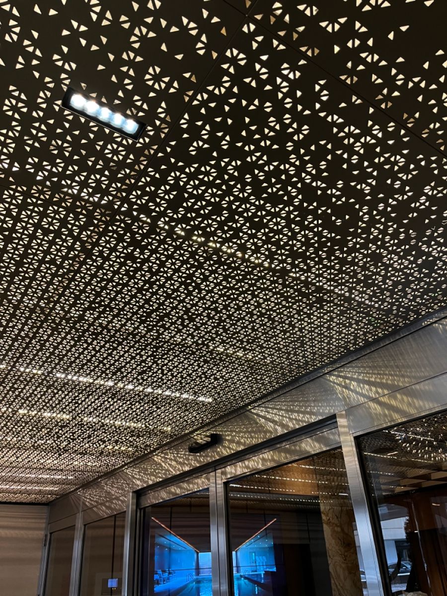 xinmaometal-black-geometric-perforated-stainless-steel-ceiling-entrance