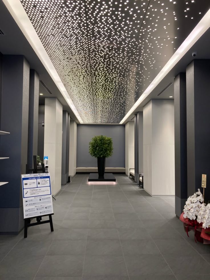 xinmaometal-silver-perforated-stainless-steel-ceiling-corridor