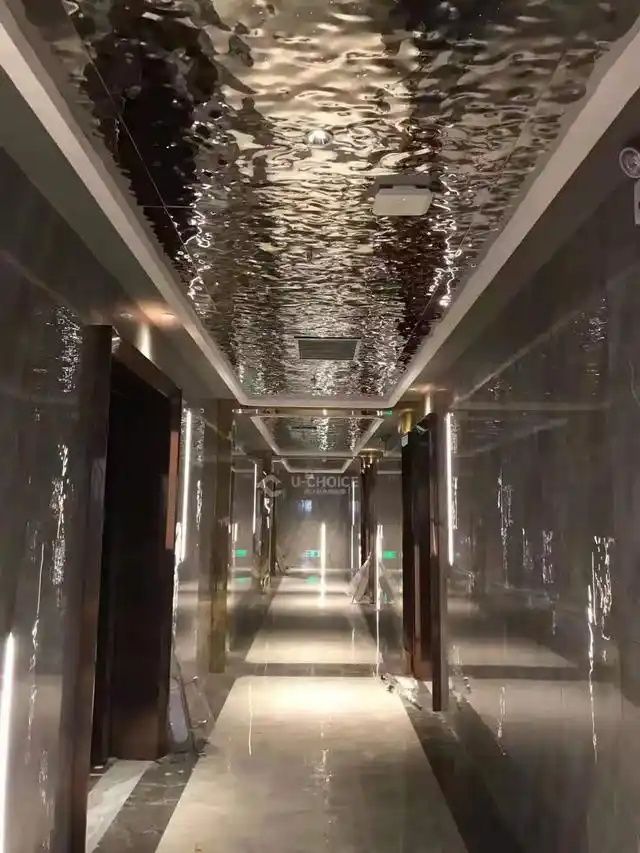 xinmaometal-silver-water-ripple-stainless-steel-ceiling-hotel-corridor
